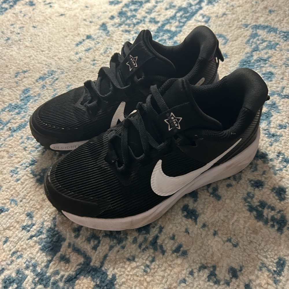 Little kids size 12 Nike black sneakers